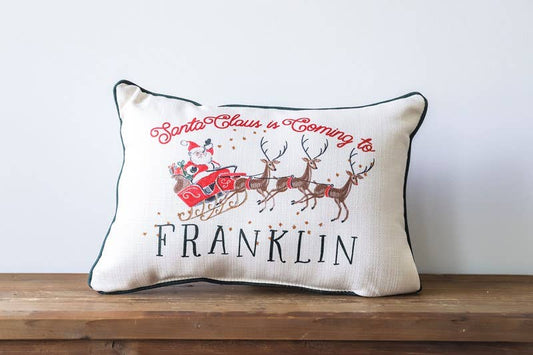 Santa Claus is Coming to Hometown Sleigh Piped Pillow